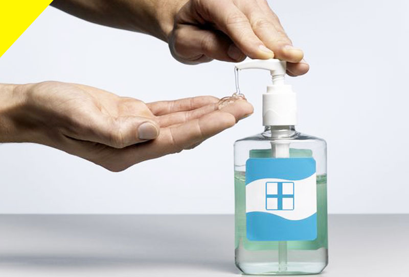 A person sanitising their hands